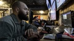 Image caption, Ukraine's military uses the network of 10,000 low Earth orbit satellites extensively for military operations