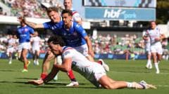 Image caption, Herbie Farnworth scored England's first World Cup hat-trick since Tommy Makinson against Papua New Guinea in 2022
