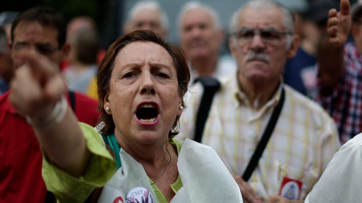 A demonstrator shouts during a rally to defend pensions in Madrid, on Saturday 13 November 2021.
AP Photo