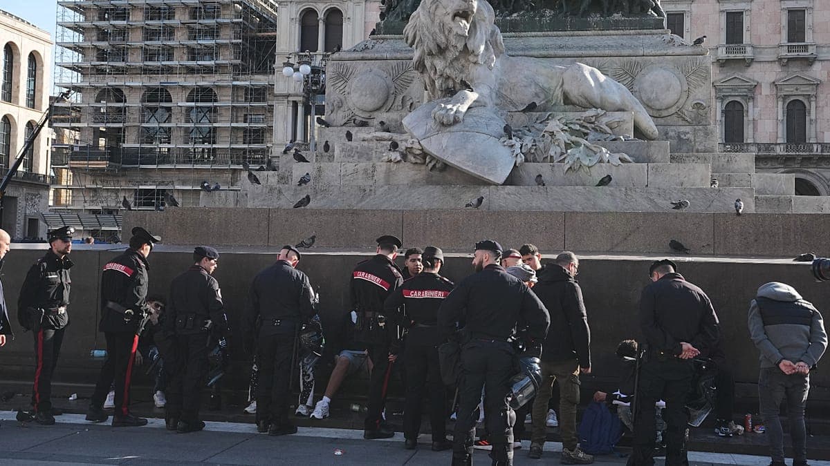 Clashes between demonstrators and police in Milan
AP Photo