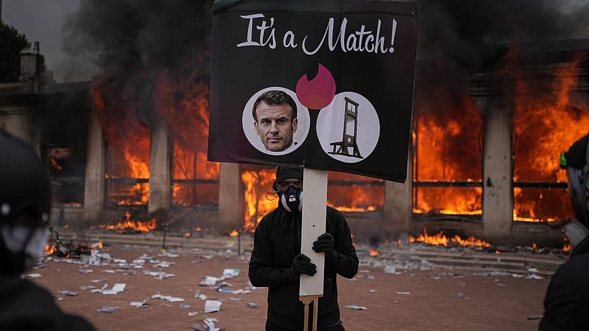Protester at a demonstration against the state of education in France
Teresa Suárez/AP